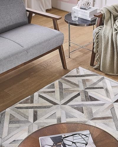 beliani-taytan-leder-teppich-140x200-cm-beige-braun-patchwork image 8
