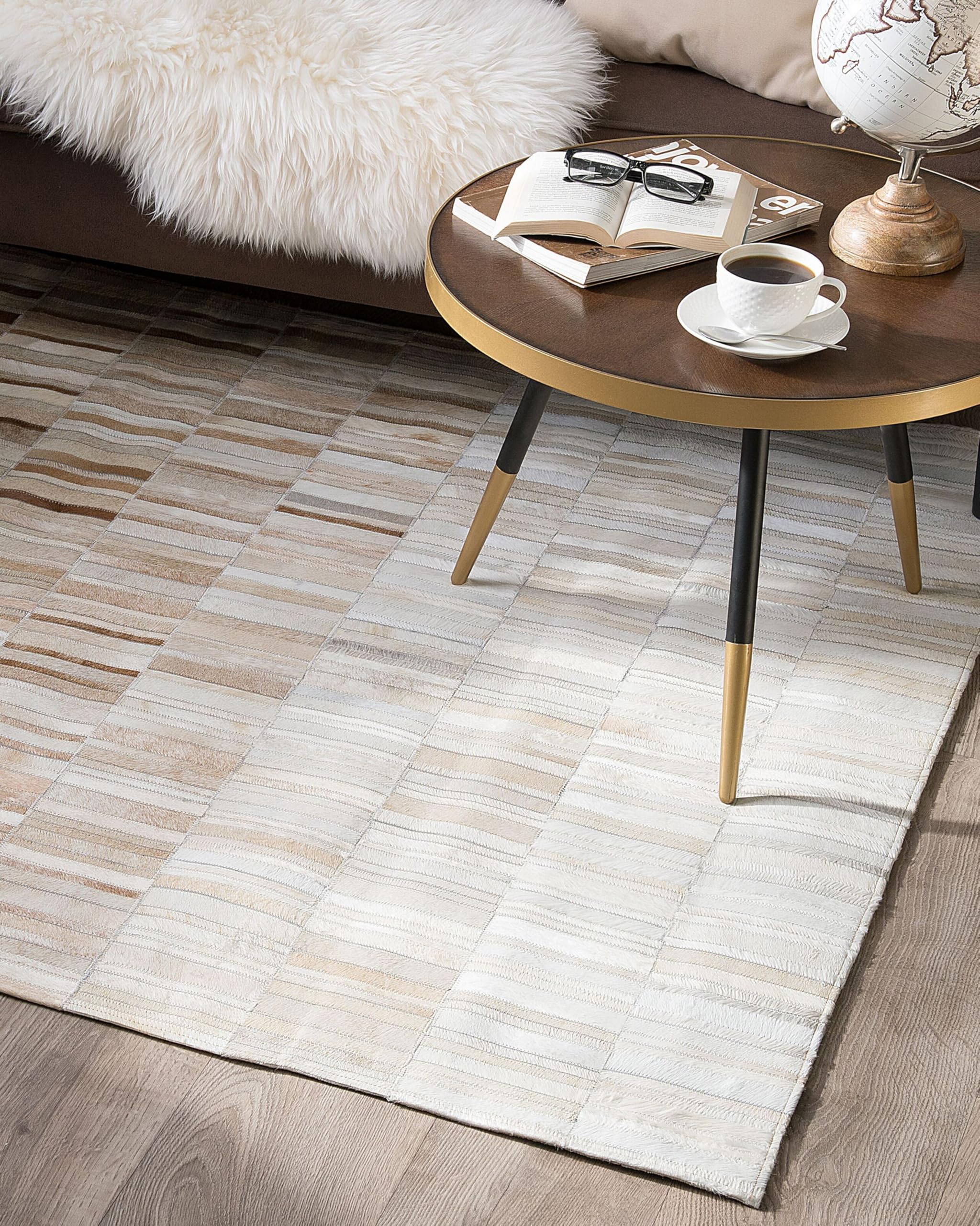 beliani-yagda-leder-teppich-140x200-beige-kurzflor image 2