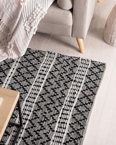beliani-fehimli-teppich-140x200-cm-schwarz-beige-leder-kurzflor image 8