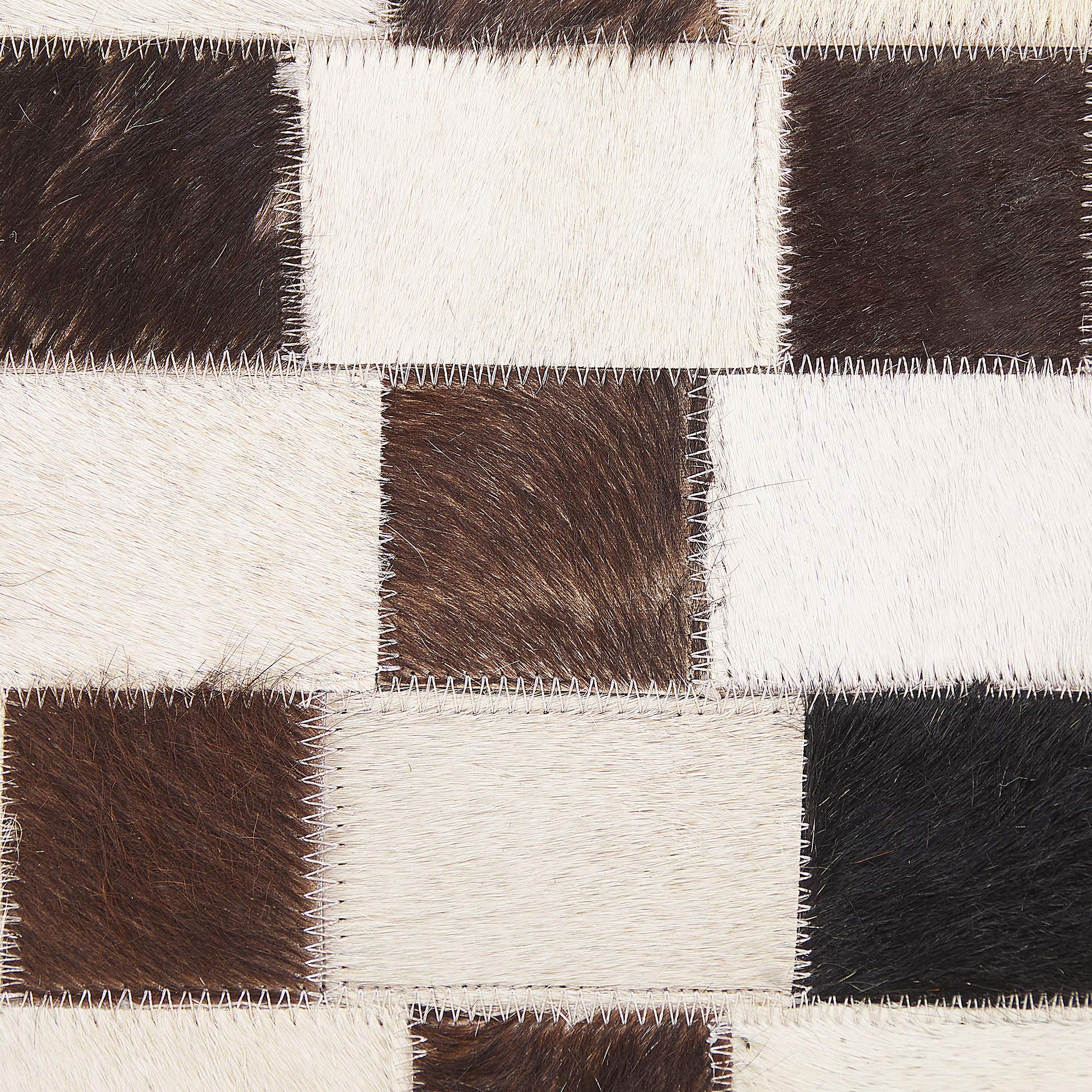 beliani-kayabey-kuhfell-teppich-140x200-braun-patchwork image 5