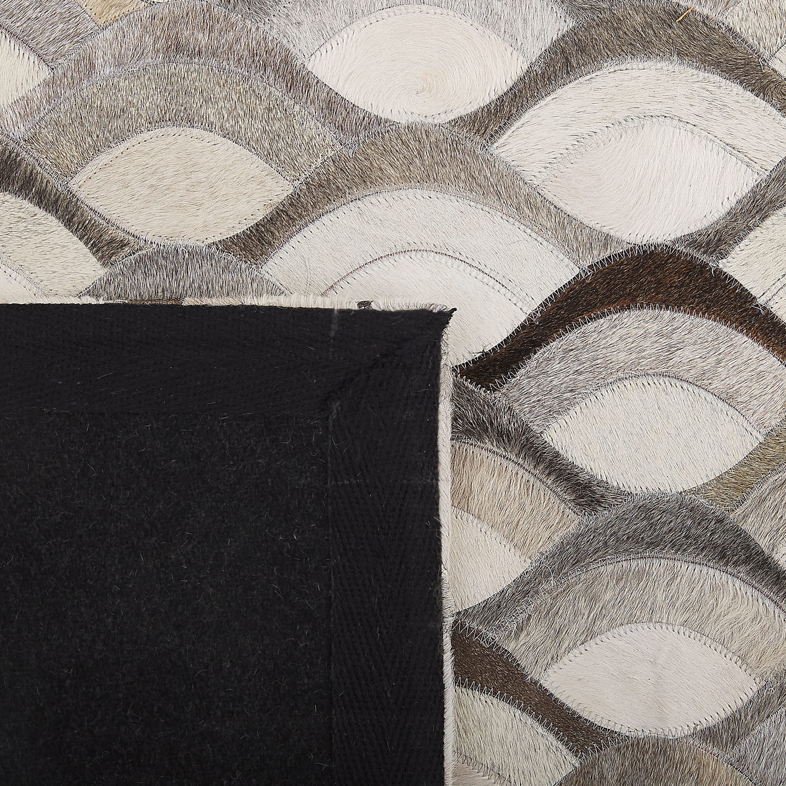 beliani-kirca-teppich-140x200-cm-braun-beige-leder-rautenmuster image 5