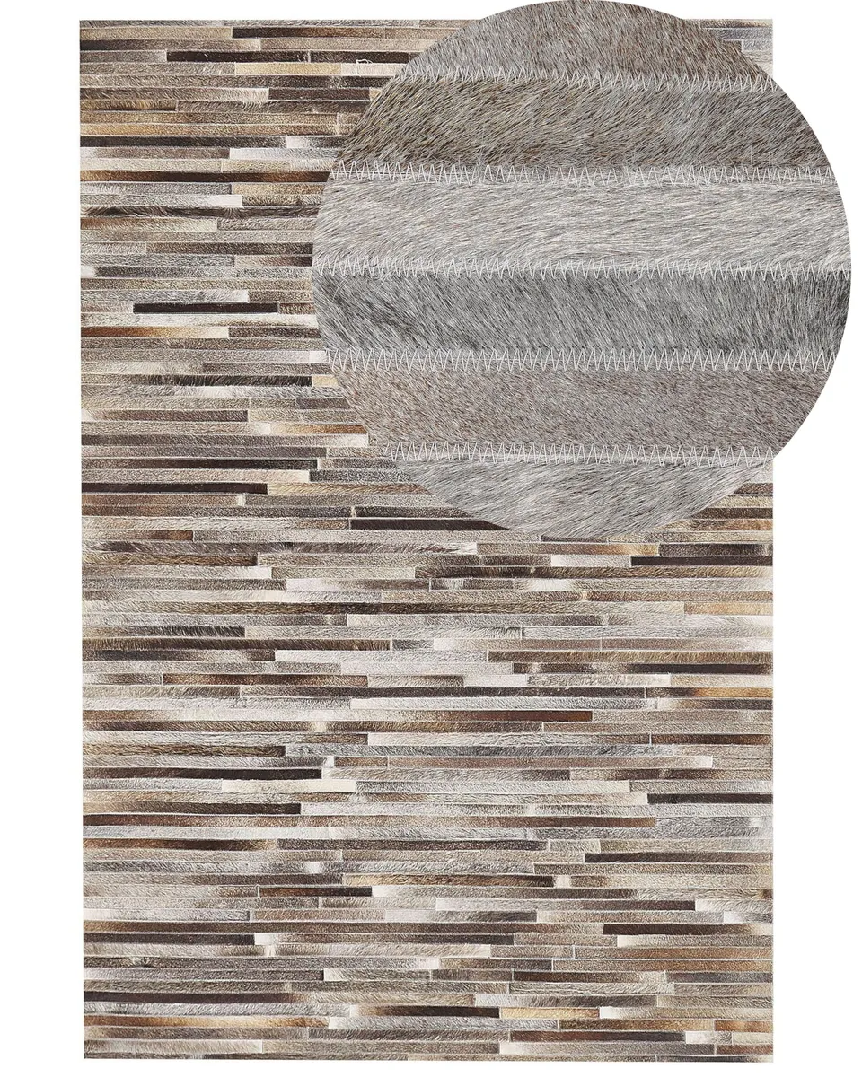 beliani-tuzluca-kuhfell-teppich-140x200-cm-mehrfarbig-patchwork image 1