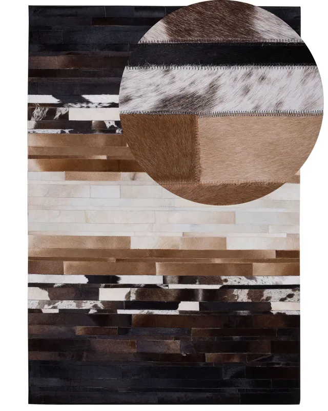 beliani-dalyan-kuhfellteppich-140x200-schwarz-beige image 1