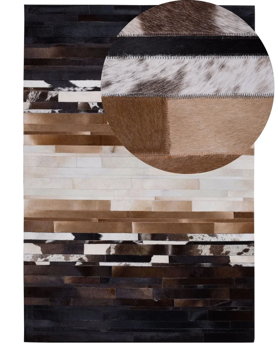 beliani-dalyan-kuhfellteppich-140x200-schwarz-beige image 1