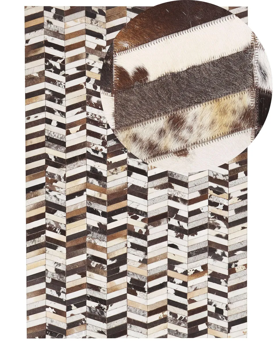 beliani-akyele-kuhfell-teppich-braun-wei-140x200-patchwork image 1