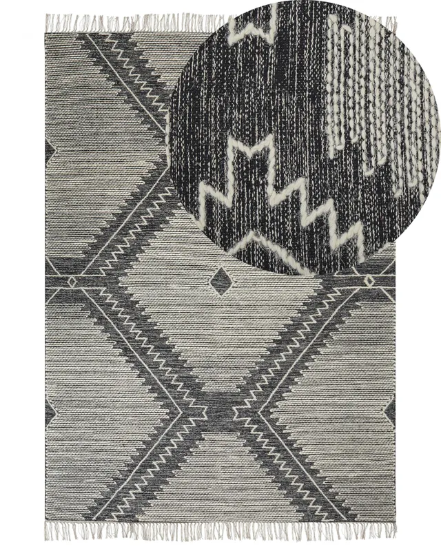 beliani-arbaa-teppich-140x200-schwarz-wei-boho-kurzflor image 1
