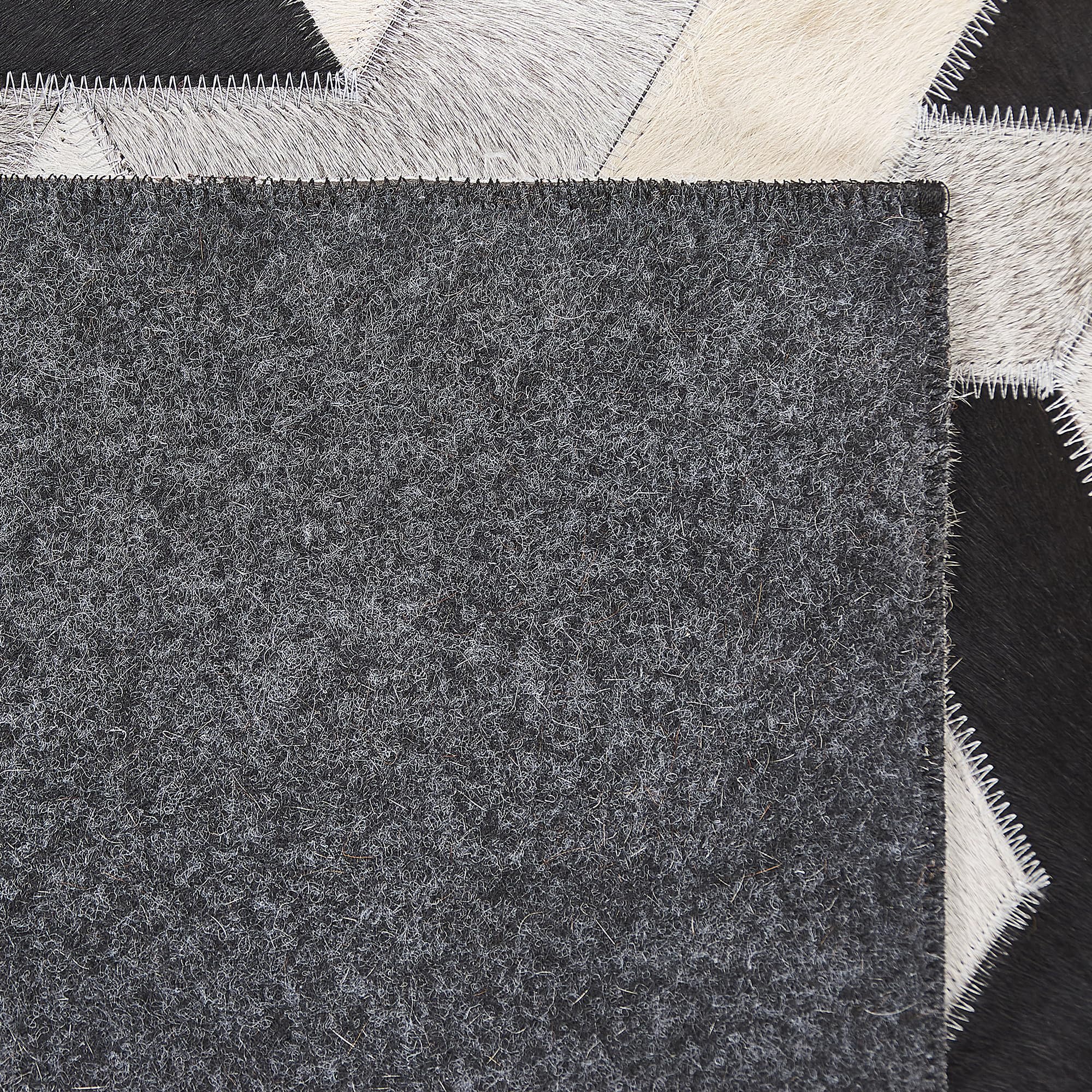 beliani-narman-teppich-kuhfell-3d-140x200-schwarz-grau image 6