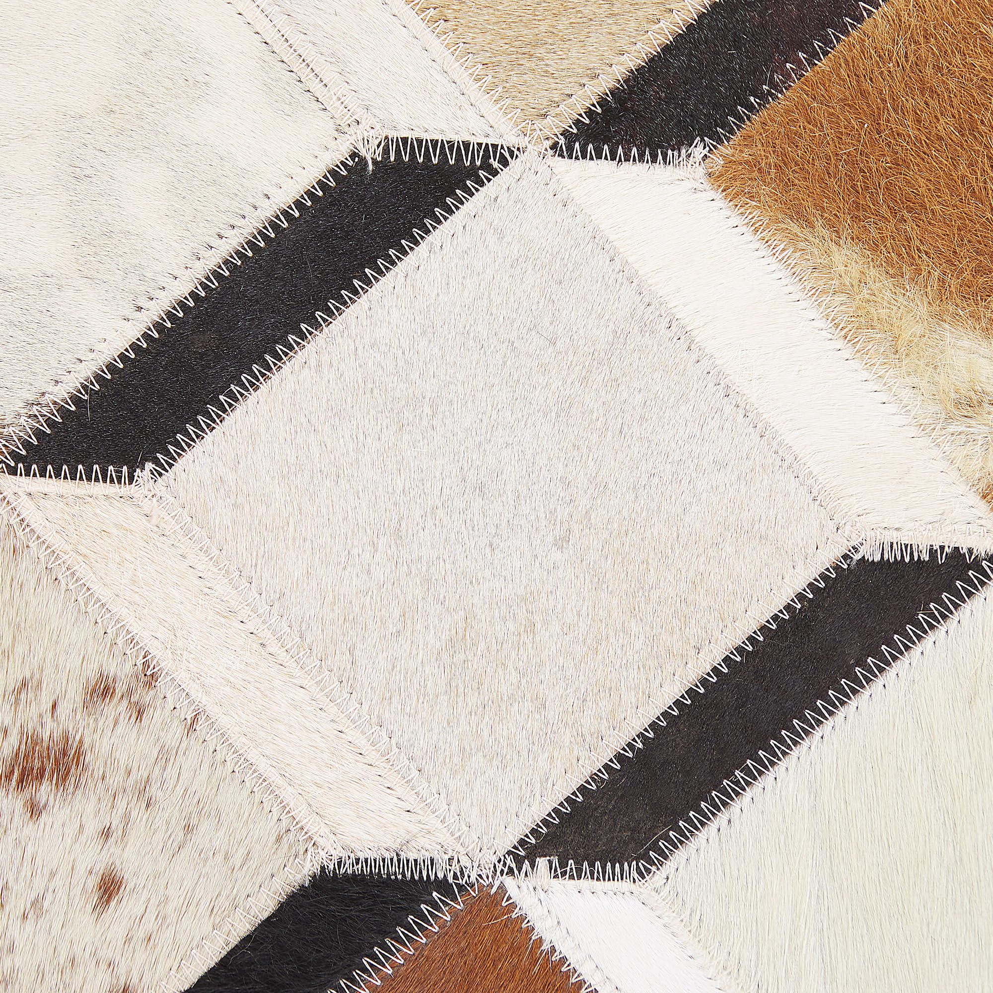 beliani-serinova-kuhfell-teppich-140x200-cm-braun-patchwork image 6
