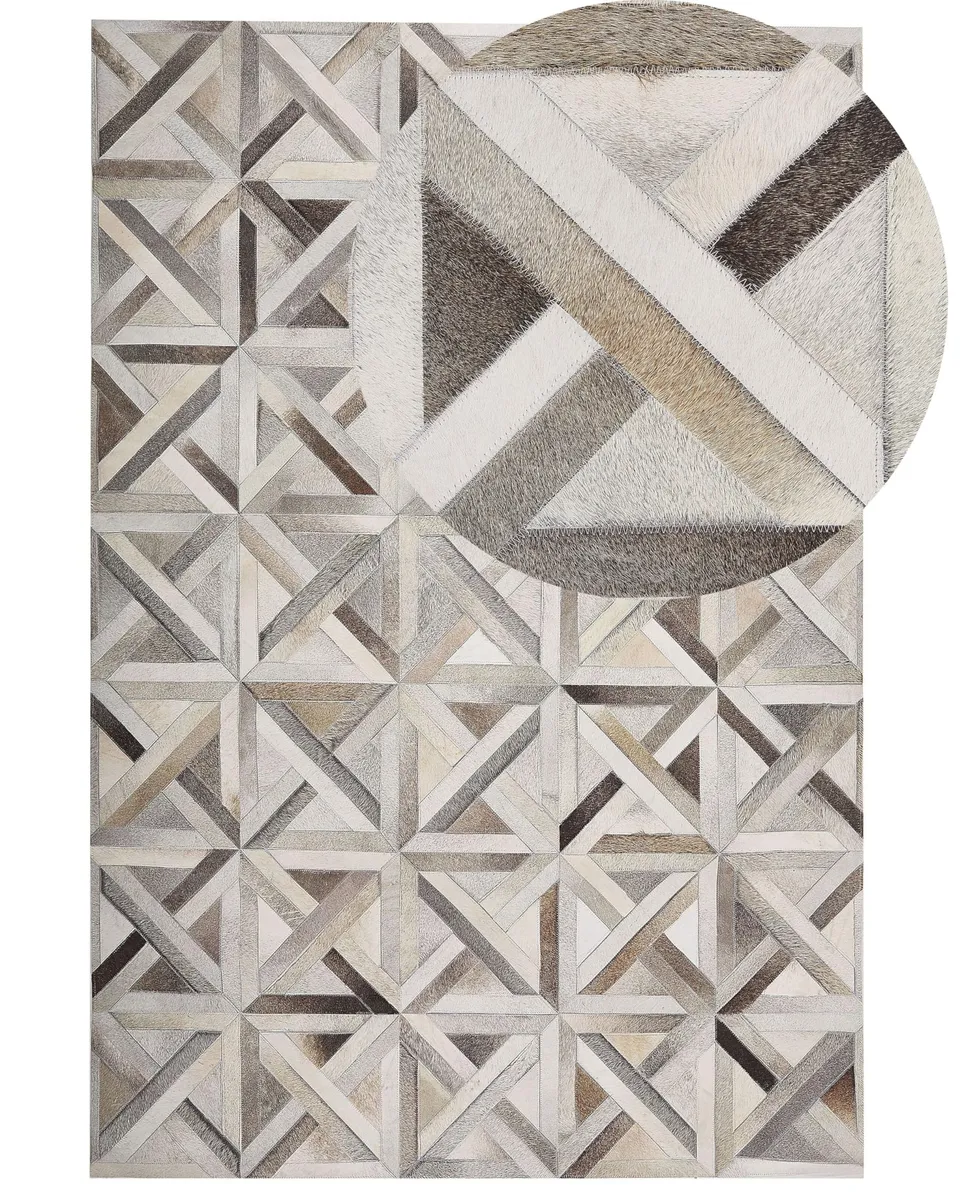 beliani-taytan-leder-teppich-140x200-cm-beige-braun-patchwork image 1