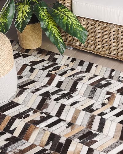 beliani-akyele-kuhfell-teppich-braun-wei-140x200-patchwork image 8