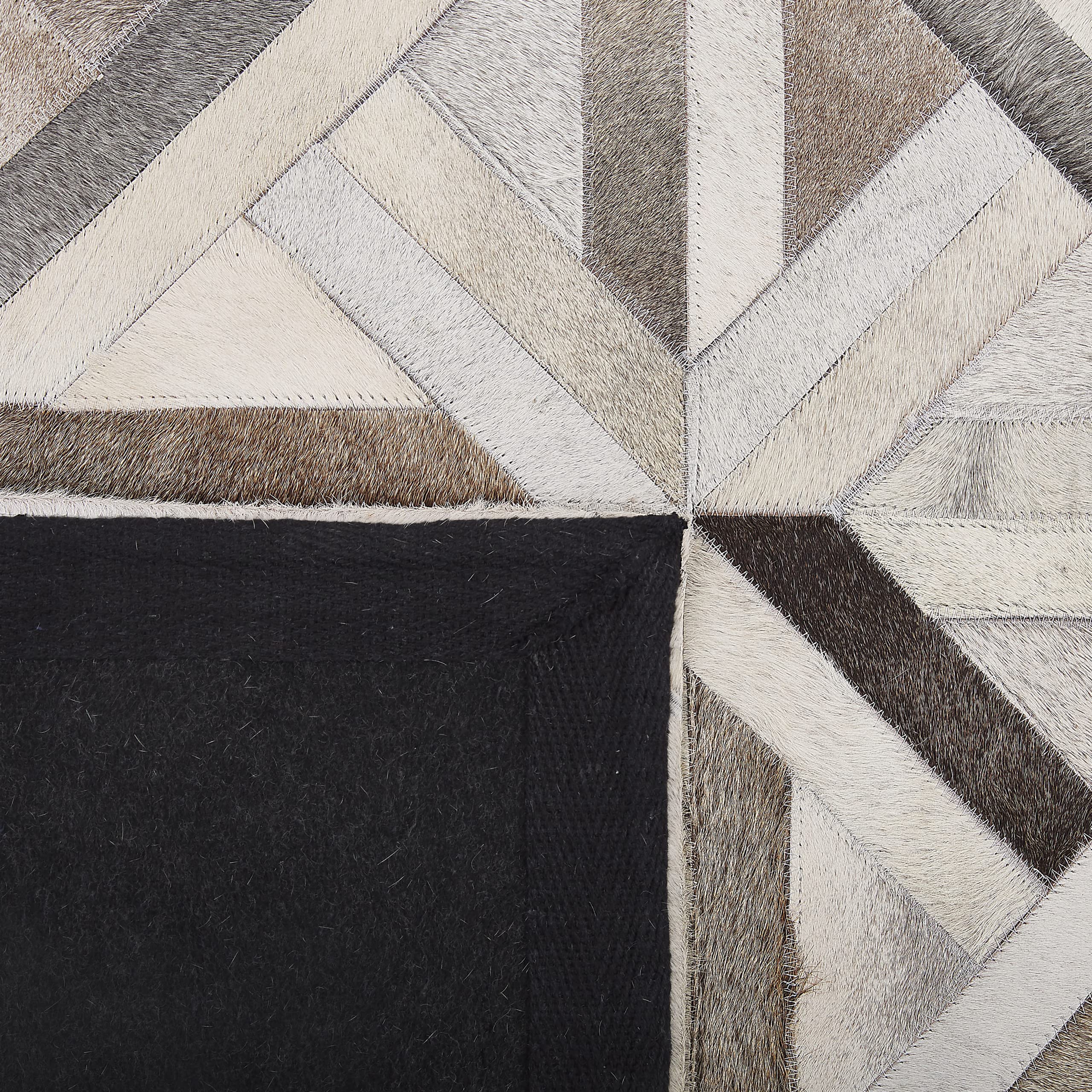 beliani-taytan-leder-teppich-140x200-cm-beige-braun-patchwork image 5